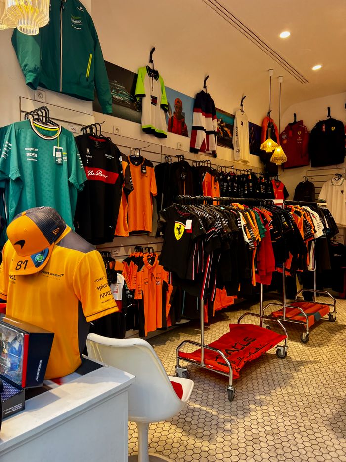 Colorful display of sports apparel and merchandise in a dynamic retail store interior.